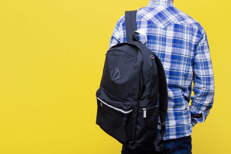 Individual performing lower back exercises to strengthen spinal muscles.