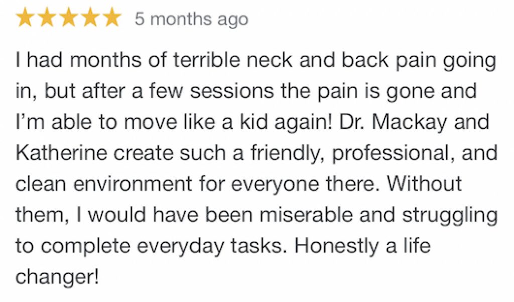 Patient receiving chiropractic treatment for neck pain in a clinic.